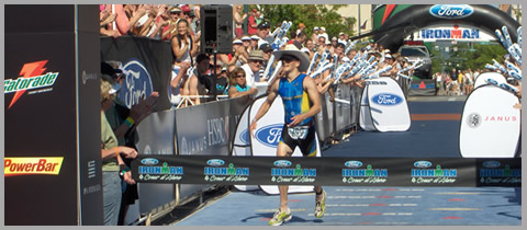 Ironman Coeur d'Alene finisher at finish line