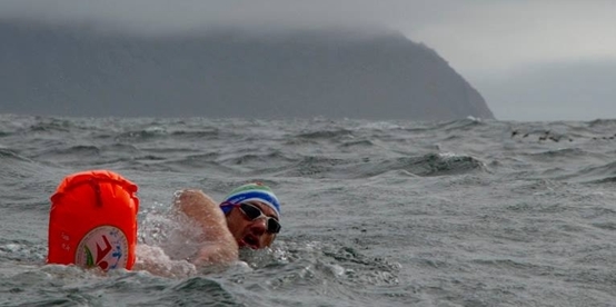 Ryan Stramrood swimming the Bering Strait Relay